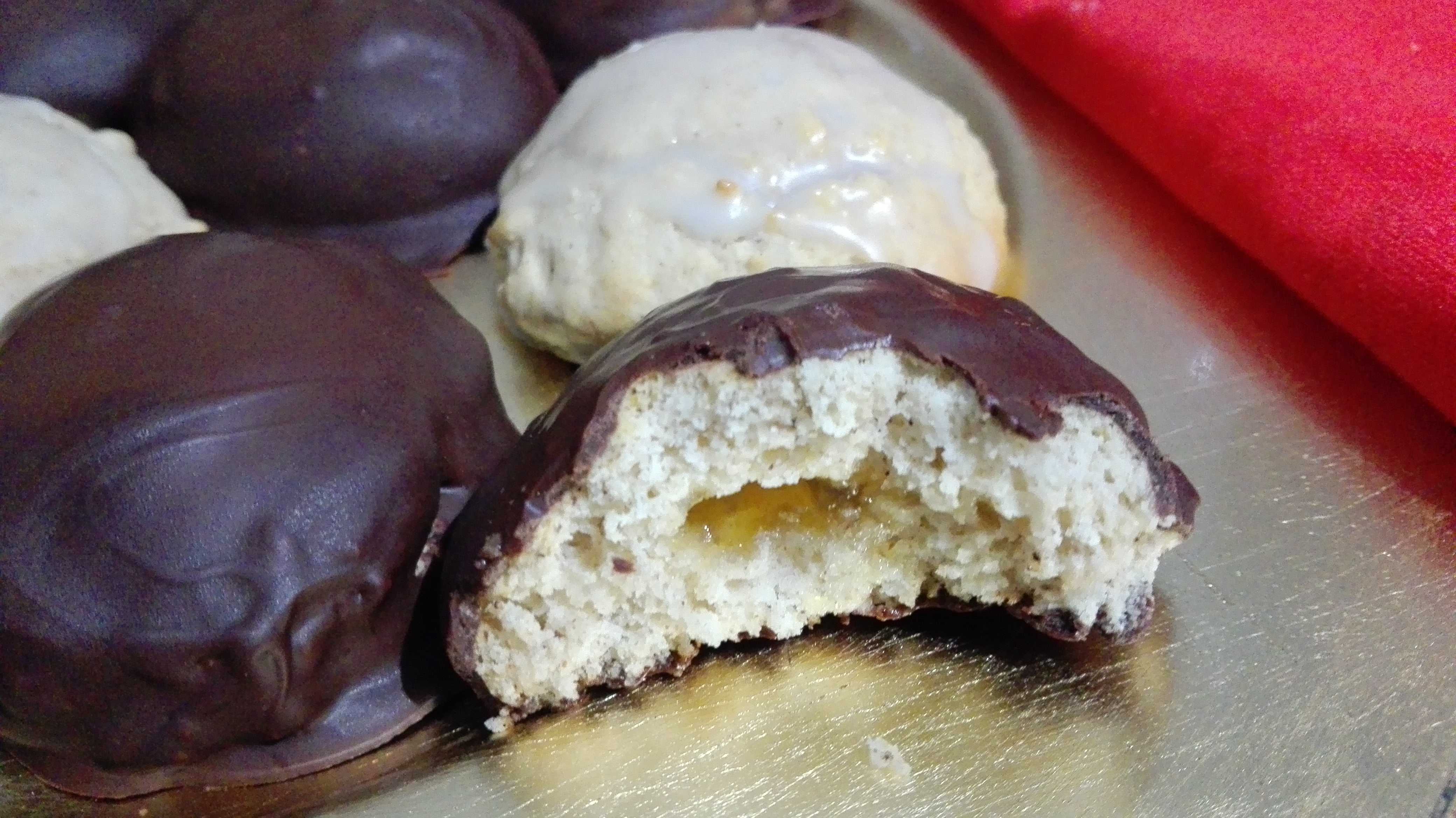 gluten free lebkuchen with a bite out of it so you can see the apricot jam in the middle - yummy!