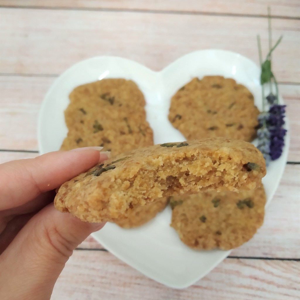 sugar free lavender and ginger biscuits with a bite out of them close up